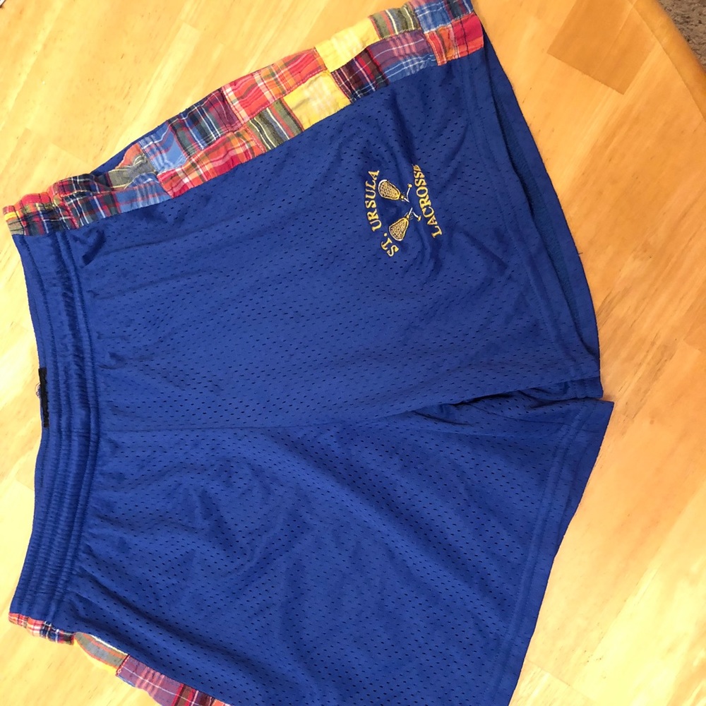 Med. athletic shorts. Royal blue with plaid sides.